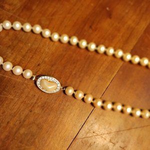 Givenchy glass-pearl necklace with decorative clasp